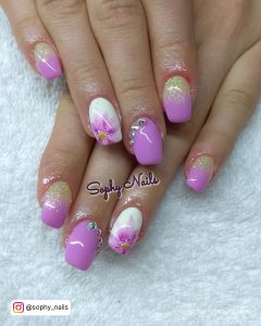 Purple And White Nails Designs With Flower On One Finger