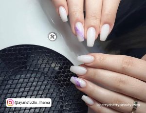 Purple Black And White Nails On A Black And White Surface