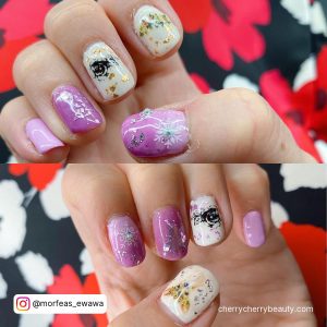 Purple Nails With White Design On A Flower Surface