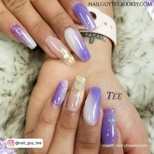 Purple White Ombre Nails On A White Surface