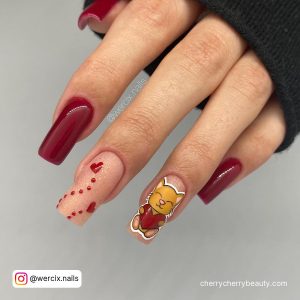 Rdark Red And Nude Square Nails With Red Design On The Nude Nail And A Cute Yellow Cate On One Nail