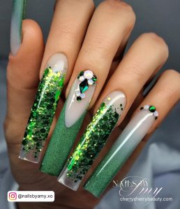 Really Long Acrylic Nails In Green With Rhinestones