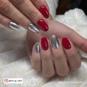 Red And Silver Nail Art On Almond Nails