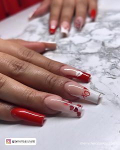 Red And White Acrylic Valentine Nails With Kiss Designs And Red Glitter Love Hearts