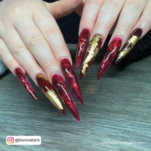 Red Long Acrylic Nails In Stilleto Shape