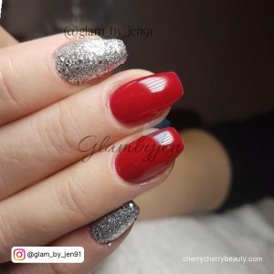 Red Nails With Silver Sparkles On Two Fingers