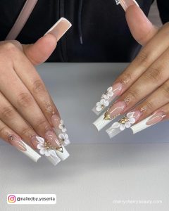 Rhinestones On White Nails With Flowers