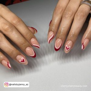 Round Tip Nude Base Simple Valentine Nail Designs With Red And White Swirl, French Tip And Heart Designs
