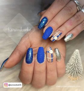 Royal Blue And Silver Nail Ideas With Check Pattern On Ring Finger