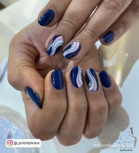 Royal Blue Nails With Silver Glitter And Swirls