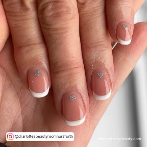 Short French Tip Nails With Small Silver Glitter Heart On The Cuticles