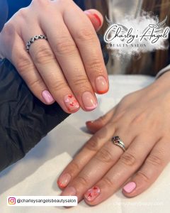 Short Pink And Red Tip Valentines Nails With Red And Pink Hearts On One Nail