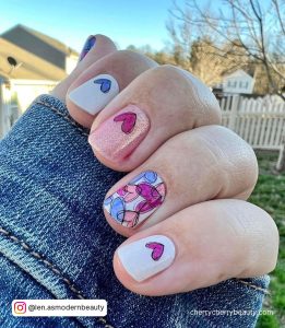 Short Pink Valentine Nails With White Nails And Cartoon Love Heart Nail Art Designs