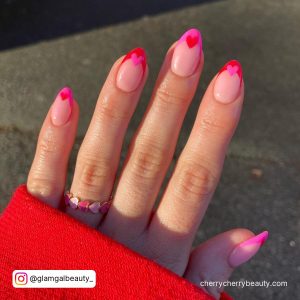 Short Round Tip Nude Nails With Dark Pink And Barbie Pink Heart Shaped Tip With Red Heart