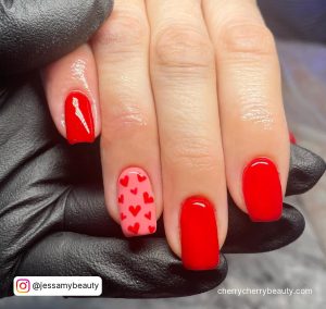 Short Square Tip Valentines Nails Pink And Red With One Pink Nail With Small Red Hearts On
