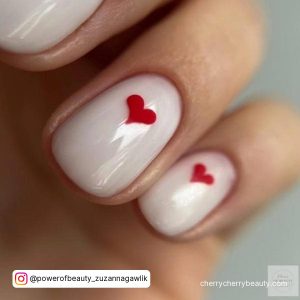 Short White Valentines Nails With Red Hearts