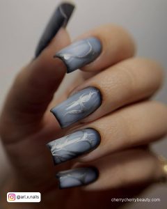 Silver Acrylic Nails With Design On All Fingers