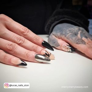 Silver And Black Nail Designs With Lv Written On It
