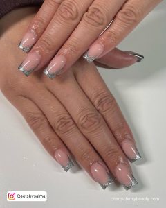 Silver French Tip Acrylic Nails With Nude Base Coat