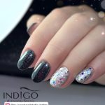 Silver Glitter Nails With Two Nails In Black