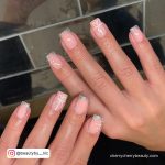 Silver Tip Nails With Bow Design