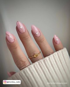 Simple Light Pink Almond Nails With Small White Hearts