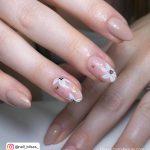 Simple White Flower Nail Designs With Black Center
