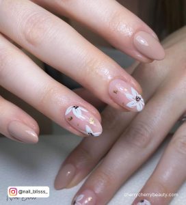 Simple White Flower Nail Designs With Black Center