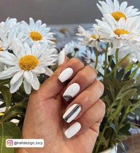 Spider Summer White Gel Nails With Sunflowers In Background