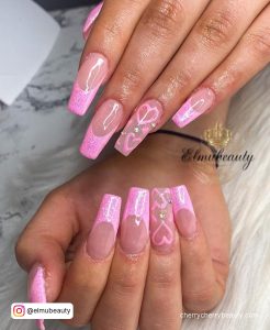 Square Tip Acrylic Nails With Barbie Pink Tips And Heart Designs