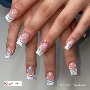 White Acrylic Nails Coffin With Blue Flower On Tips