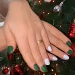 White And Green Nail In Front Of A Christmas Tree