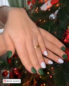 White And Green Nail In Front Of A Christmas Tree