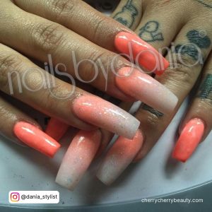 White And Orange Ombre Nails With Glitter