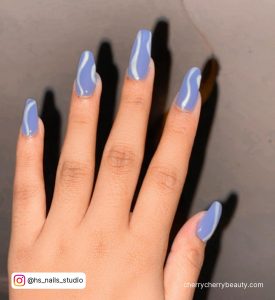 White And Purple Marble Nails For An Elegant Look