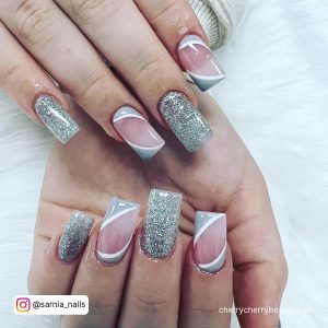 White And Silver Swirl Nails For A Fancy Look