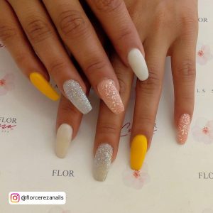 White And Yellow Nails With Glitter