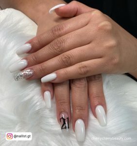 White Coffin Nails With Silver Glitter And 21 Written In Black