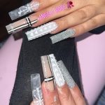 White Coffin Nails With Silver Glitter With One Nail In Burberry Design