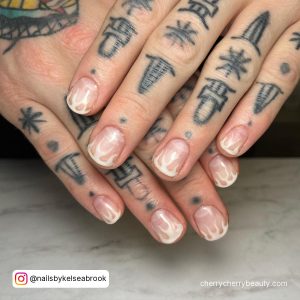 White Flames Nails With Tattoes On Fingers