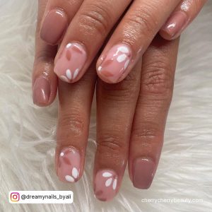 White Flower Nail Art On Pink Nails