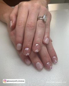 White Flower Nail Art With Ring In One Finger