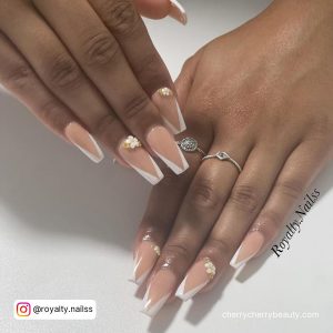 White Flower Nail Designs On One Finger