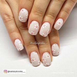 White Flower Nails With Light Pink Base Coat