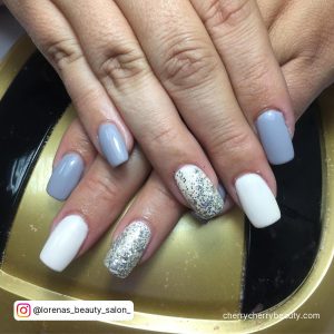 White Gray Nails On A Yellow Surface