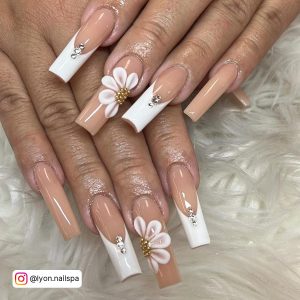 White Long Nail Ideas With Flowers And Rhinestones