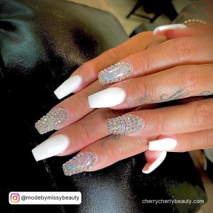 White Matte Nails With Diamonds On Two Fingers