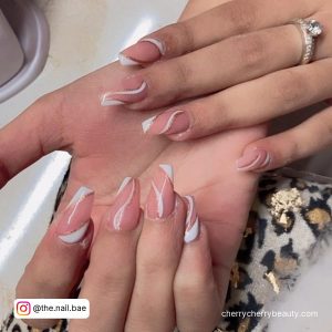 White Nail Swirls With Golden Lines
