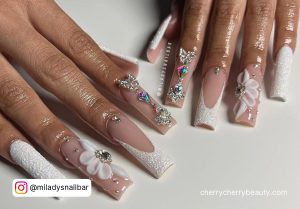 White Nail With Rhinestones In Pink And Blue