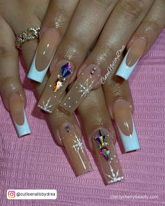 White Nails With Blue Rhinestones And White Tips
